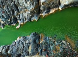 Suppose that 25 days ago the observed market variable percentage change was 2.3% with a daily volatility estimate of 2%. What is the sample percentage change using the Hull and White (HW) approach if the current daily volatility is estimated at 2.8%?